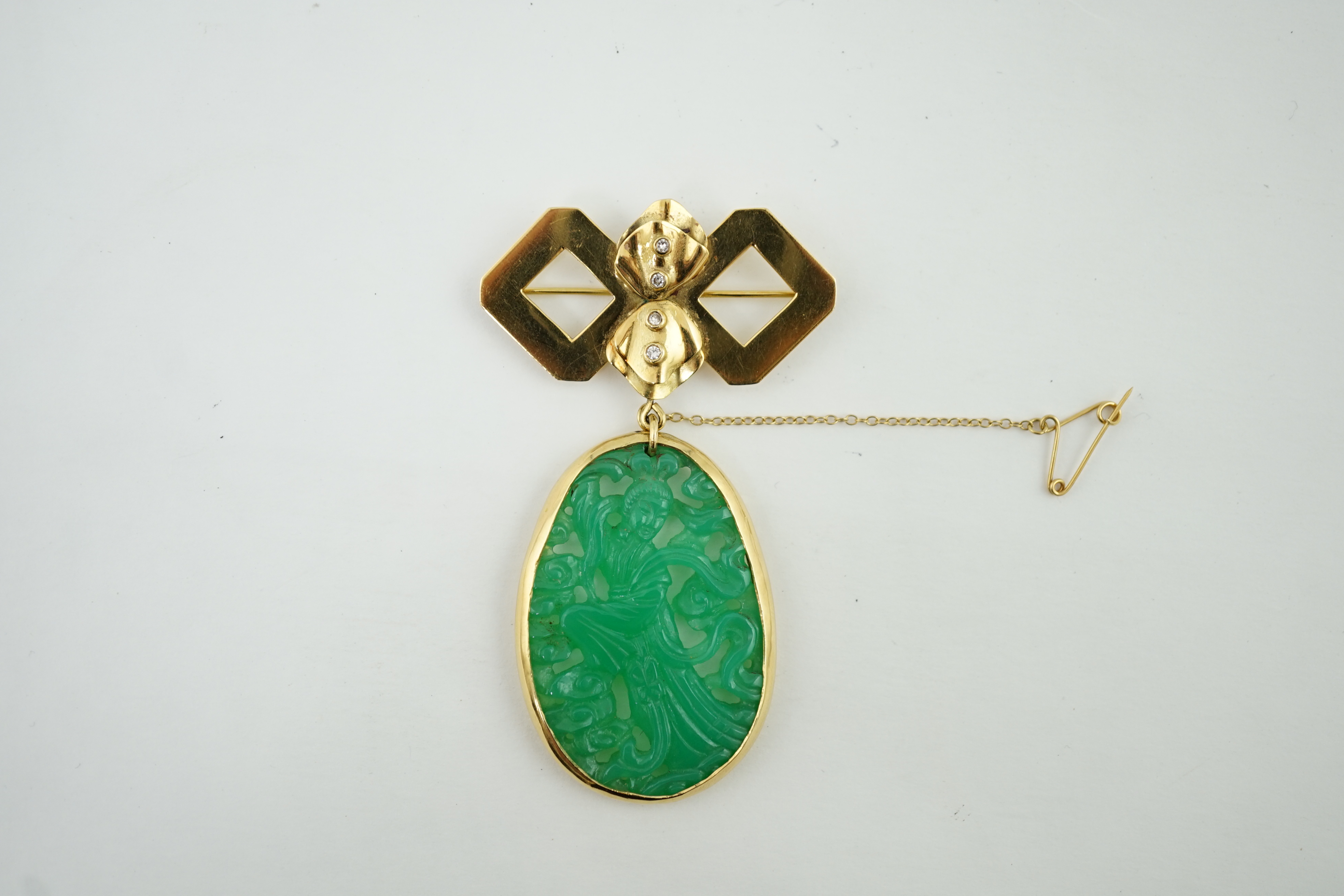 A modern 18ct gold and four stone diamond mounted jadeite drop brooch